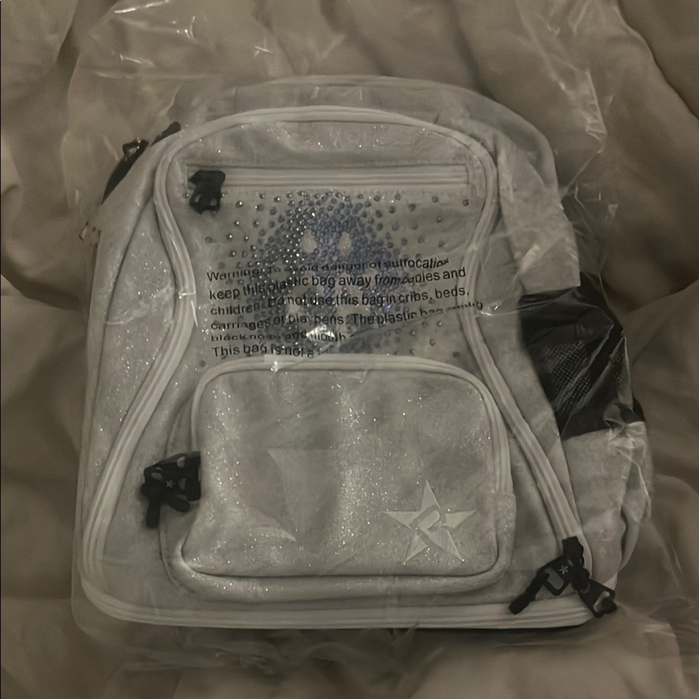 White and Black Backpack with Star Design